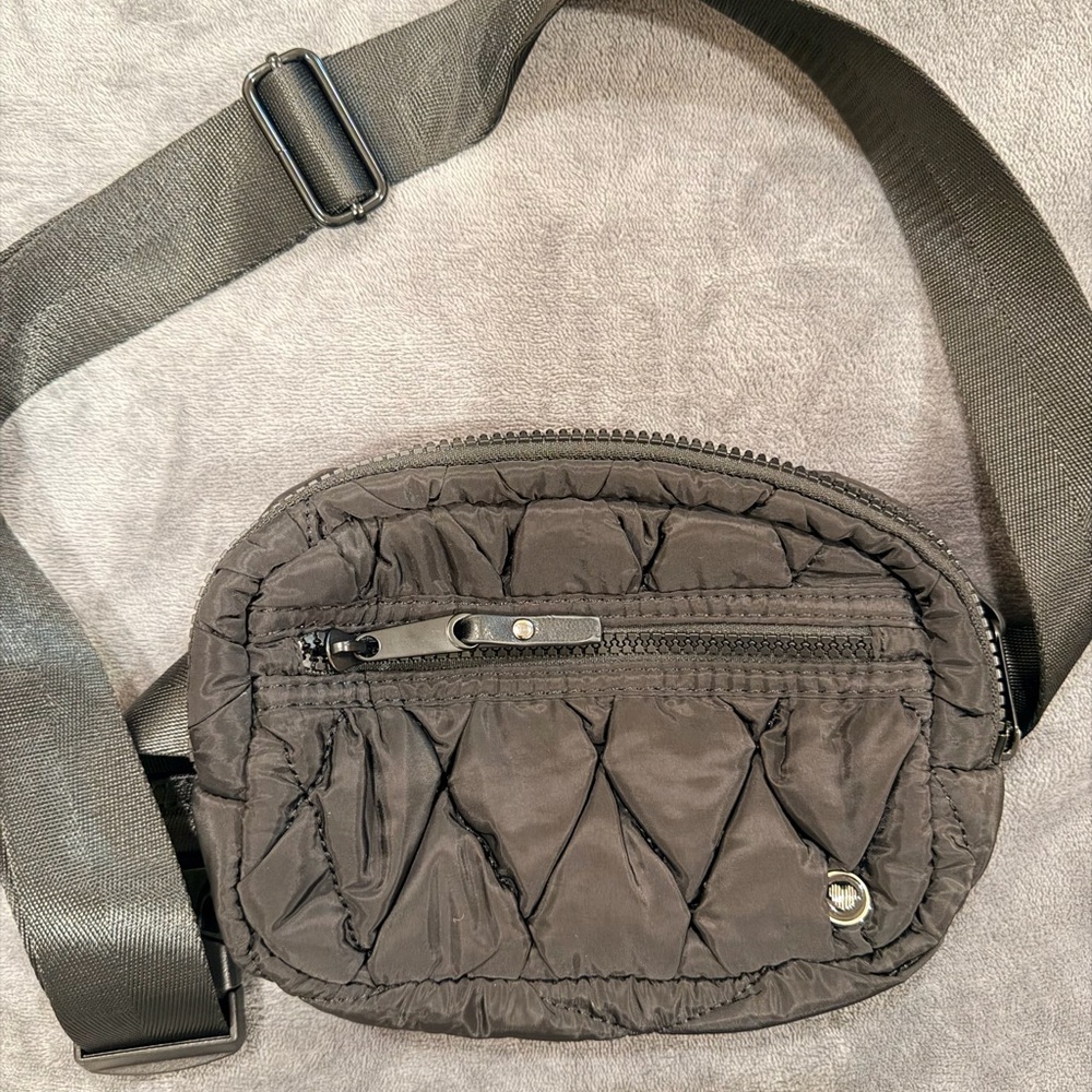 Claire's black quilted belt bag